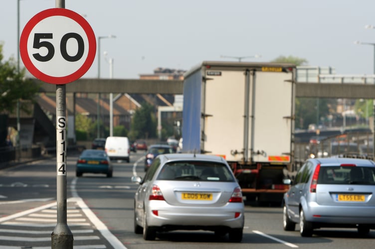 Cars pass a 50mph speed limit sign on the A3 in New Malden, south west London. Wide-ranging proposals to dramatically cut the number of deaths on the roads were set out by Road Safety Minister Jim Fitzpatrick today as he also confirmed a major overhaul of the driver training and testing process.