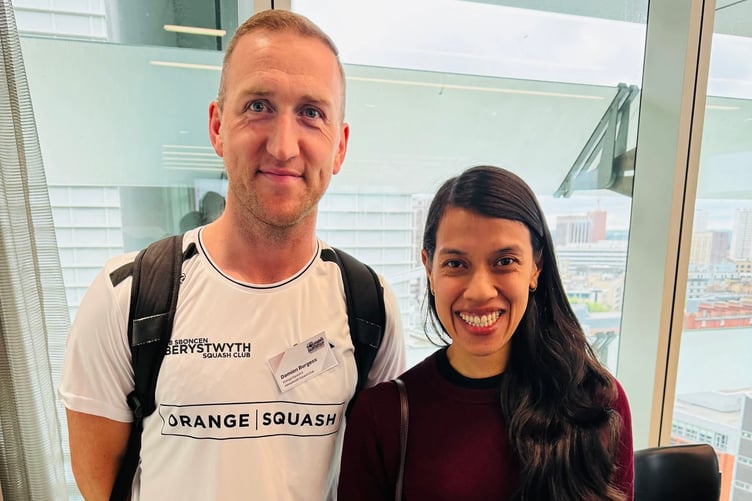 Damian Burgess with squash royalty Nicol David