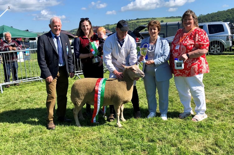 Judge Arthur Davies, Carys Haf Davies, Celt Davies and Gethin Davies (sheep interbreed owners), Sheila Rattray, show president and Jean Evans, show chairperson