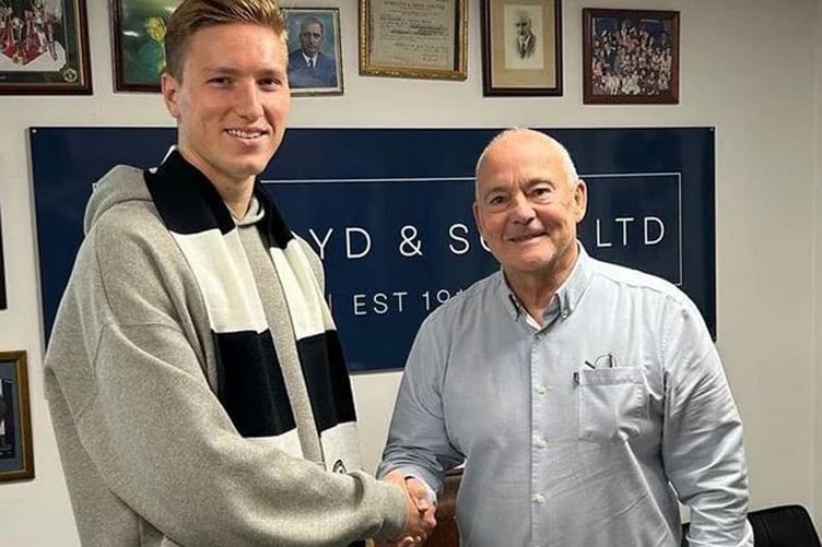 New Bala keeper Joel Torrance is welcomed by chief executive Nigel Aykroyd