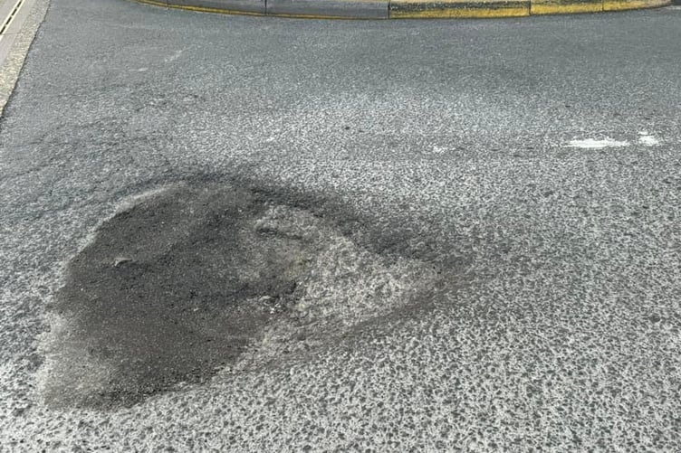 Morrisons pothole