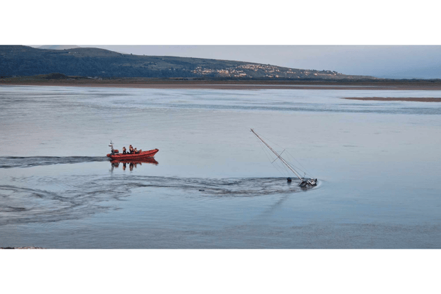 Two rescued as yacht sinks off Gwynedd coast