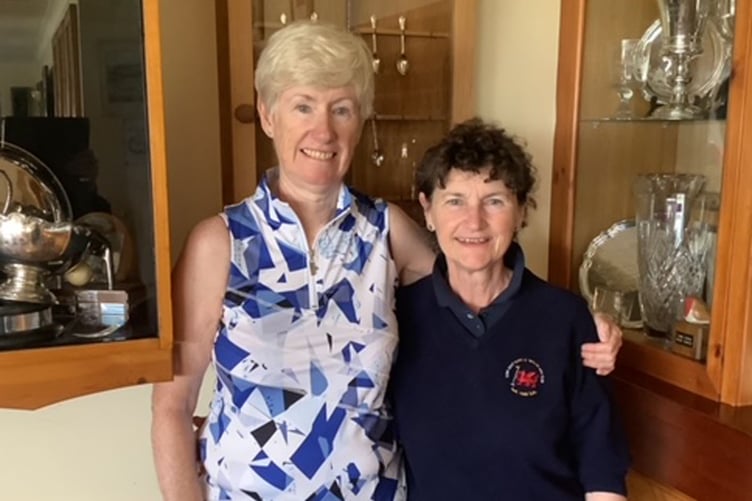 Jane being congratulated by captain Catrin Pugh Jones