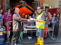 Church club members donate £70 to RNLI