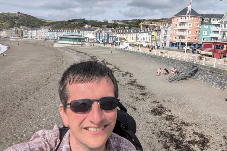 Andrew Cowell, 48, on his journey. A savvy day-tripper travelled 1,000 miles and visited over 80 different towns and cities in one journey for just £165 - after taking advantage of the government's bus fare cap. Andrew Cowell, 48, set off from his home in Allestree, Derby, on June 10 and headed to Lancaster before touring the entire coastline of England and Wales. His 13-day trip saw him take 80 buses around the two nations, with the vast majority costing no more than £2 each thanks to the fare cap. Andrew started his journey travelling from Derby to Lancaster on six different buses before navigating his way to Middlesborough the following day.