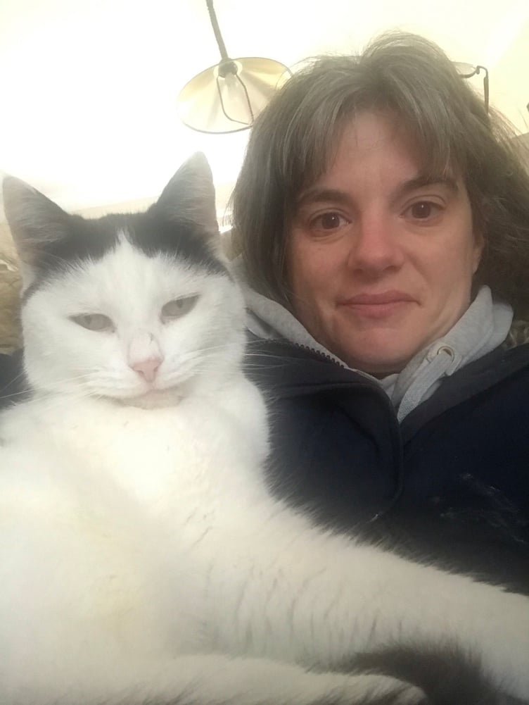 Alyson with one of her beloved cats