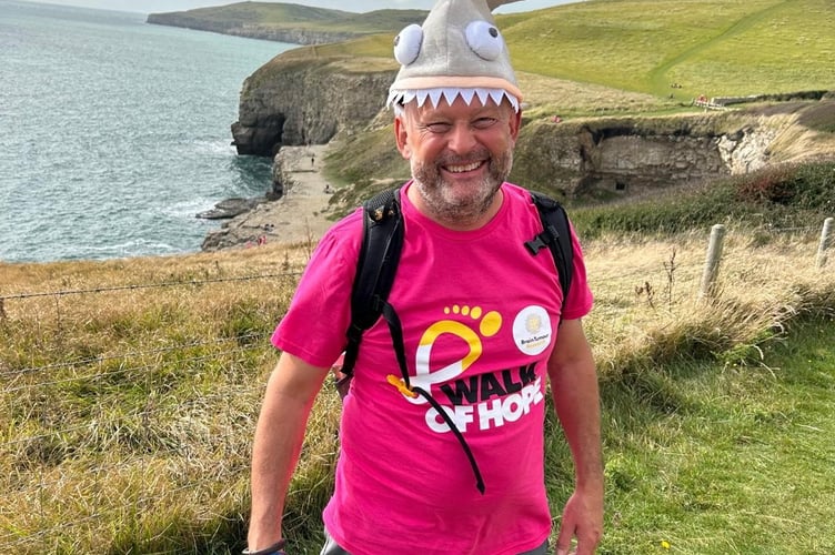 Andy Hampton on the Walk of Hope. A father dying of brain cancer is climbing Snowdon to defy the odds and help prevent future generations from suffering from the disease. Andy Hampton, 54, was diagnosed with a deadly glioblastoma (GBM) brain tumour 14 months ago. Despite the immense challenges, the father-of-four from Dorset will be scaling Yr Wyddfa, a 1,085 metre (3,560 feet) peak in Wales, on Saturday 6 July. Andy will be raising money and awareness for Brain Tumour Research - and his four-year-old daughter Isabelle will be right by his side on the climb. 
