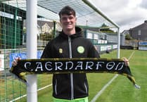 Caernarfon Town sign keeper Stephen McMullan before big Crusaders tie