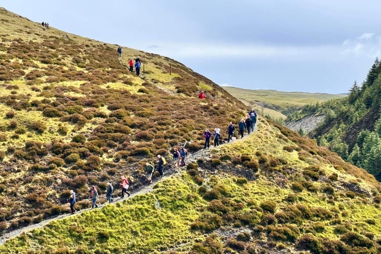 The hikers raising awareness of the proposed development, walking on 7 July in the rain and sun