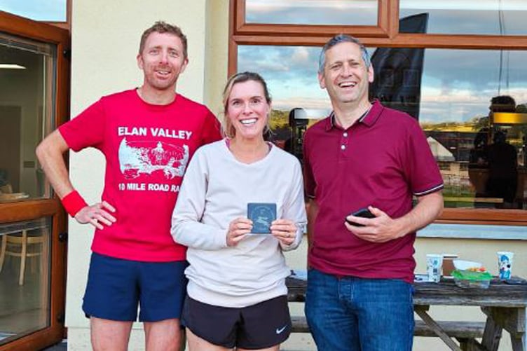 Claire Morris and Owain Schiavone with Rhys Burton, race director
