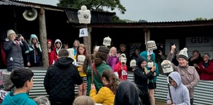 Devil’s Bridge ‘speckled hat’ auction raises thousands for Tir Dewi