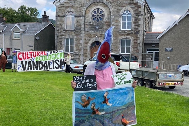 A group of people gathered to protest the Cambrian Birds shoot in Pennal