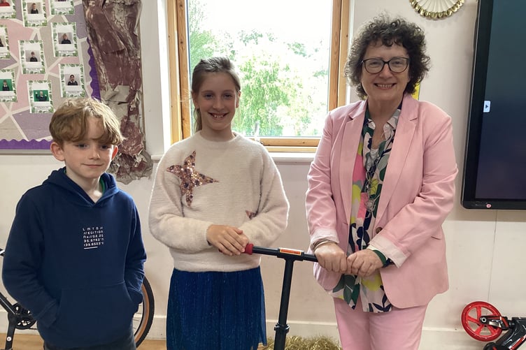 Elen Jones MS kindly helped with awarding Samson Goldsmith from Year 4 and Annabelle Szel-Kato from Year 6 with Scooterer of the Week