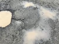 Budget surplus 'should be used to fix potholes'