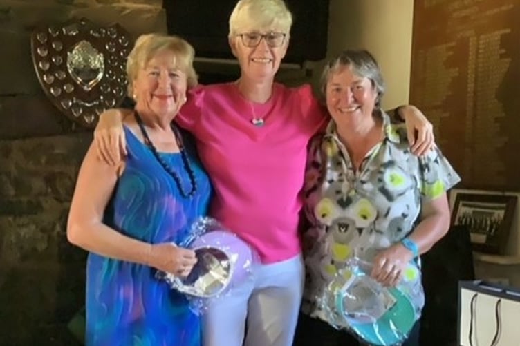 Breda Bermingham Roberts and vice Captain Helen Lewis being presented with second prize by Captain Catrin Pugh Jones