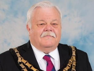 Minute's silence held following death of respected councillor