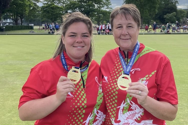 Lampeter Bowling Club's Alis and Anwen Butten with their medals