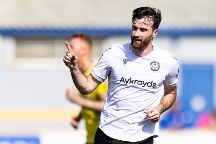 BARRY, WALES - 10TH AUGUST 2024:
George Newell of Bala Town celebrates scoring his sides first goal from the penalty spot.
Barry Town United v Bala Town in the JD Cymru Premier at Jenner Park on the 10th August 2024. (Pic by Lewis Mitchell/FAW)