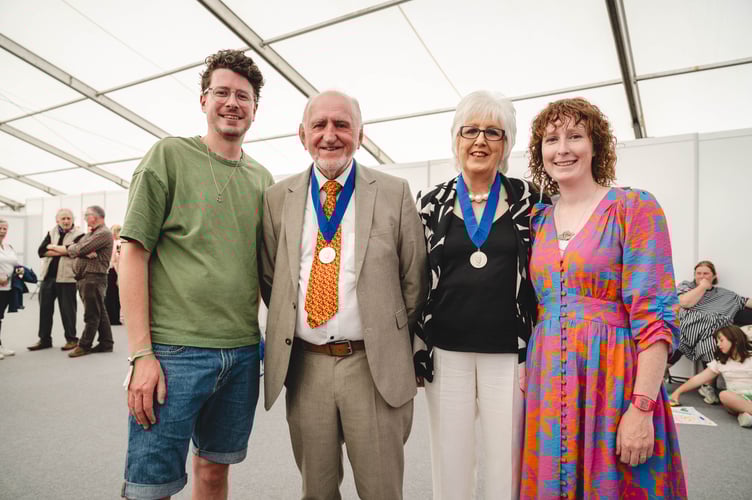 Sir T H Parry Williams memorial award medals were presented to the two founders of Cwmni Theatr Maldwyn by the children of a man who was key to the success of the company,
Penri Roberts and Linda Gittins.