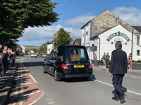 Machynlleth lines the street to bid farewell to Cllr Michael Williams