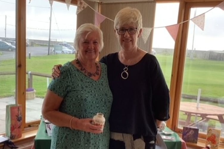 Doreen Jones receiving the best score in the 9 hole competition