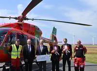 Gwynedd silver band present £2,500 to air ambulance charity