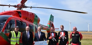 Gwynedd silver band present £2,500 to air ambulance charity