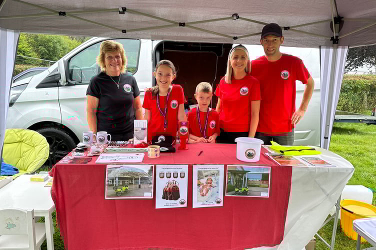 The family on the stand at Llanilar Show