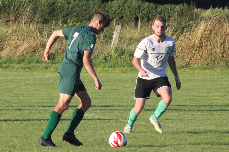 Tom Edwards scores his second goal against Llanidloes