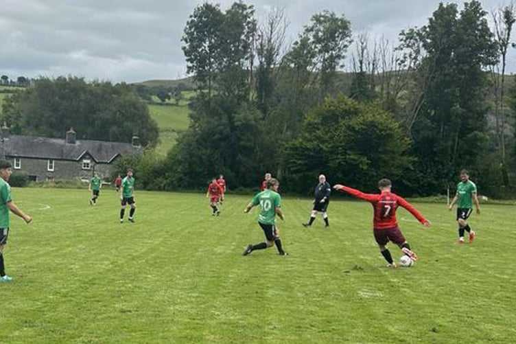 Action from Dewi Stars' hard fought 1-0 win against visitors New Quay on Saturday