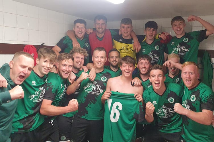 Tregaron celebrate their win and debutant Wil Evans' 16th birthday