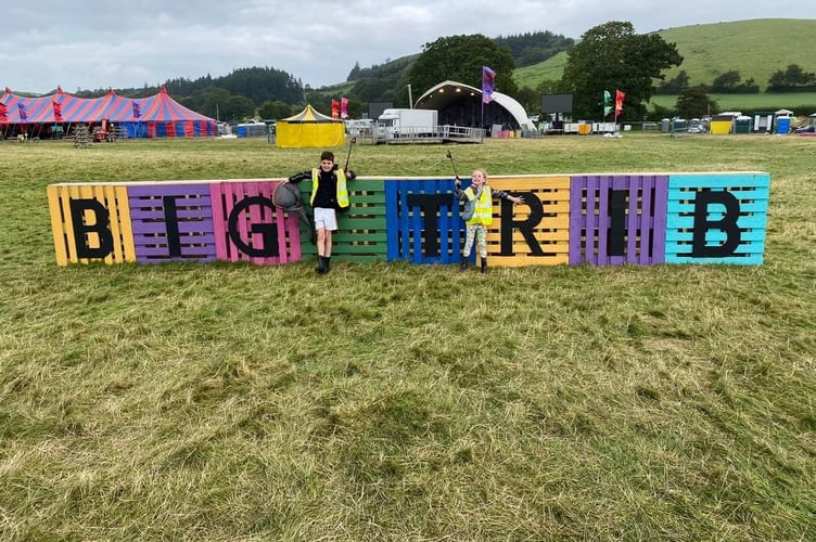 The 2nd Penparcau Scouts were on hand on Monday to pick up litter in Lovesgrove in return for a donation from the festival. Cub Fin was joined by sister Jess.
