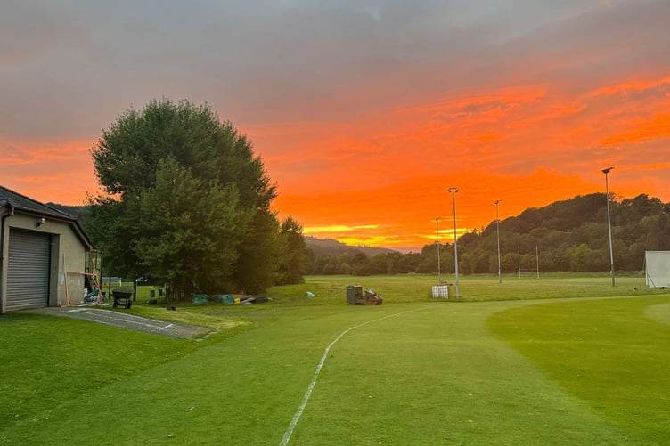 Dolgellau player Rob Humphreys captures an image of the sun setting after the last home match of the season