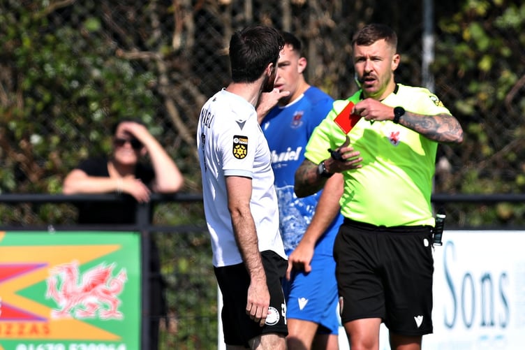 BALA, GWYNEDD, WALES - 31st AUGUST 2024 - Bala's George Newell is sent off during Bala Town vs Penybont FC in Round 5 of the JD Cymru Premier at Maes Tegid, Bala (Pic by Sam Eaden/FAW)