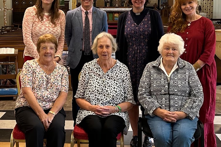 Maryanne Lineker-Mobberley (back left) and Alexander Clement from Halls Fine Art with the Rev Miriam Beecroft and Rachal Sear (back right) and (front from left) church members Joanne Gower, Ann Humphreys and Joyce Price