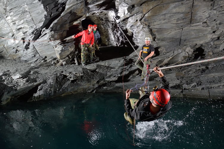 Visitors at Go Below must traverse an underground route through a series of mines and caverns before reaching Deep Sleep 1,375ft below Snowdonia. Release date September 11 2024. A unique underground hotel experience 1,375ft below Snowdonia's depths promises 'the deepest sleep in the world'. The adventure, promised to be an 'experience like no other on Earth', sees people venture down through an abandoned Victorian slate mine to reach a remote off-grid camp of Deep Sleep. Set a staggering 1,375 vertical feet below the mountains of Snowdonia and with an all-year-round temperature 10 degrees Celsius, the camp comprises of four private twin-bed cabins and a 'romantic grotto' with a double bed.