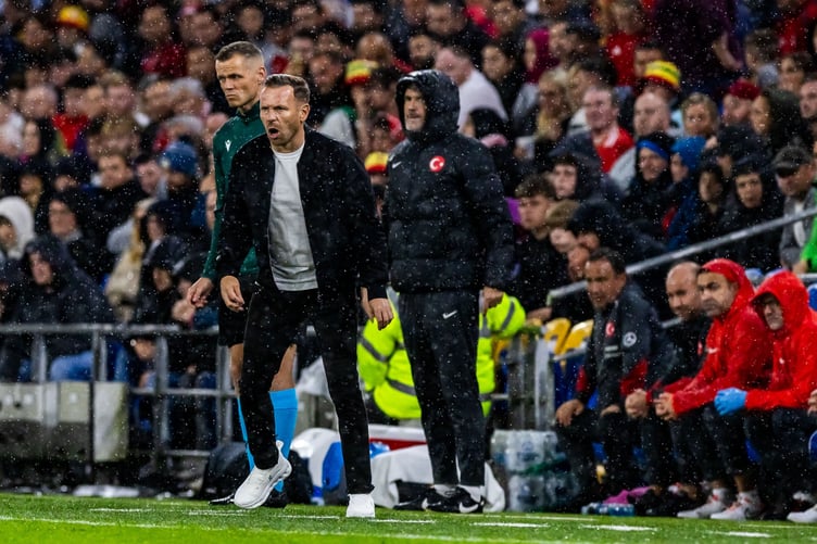 Craig Bellamy encourages his players on the touchline