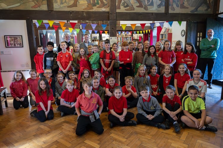 Bellamy with pupils from Ysgol Bro Hyddgen