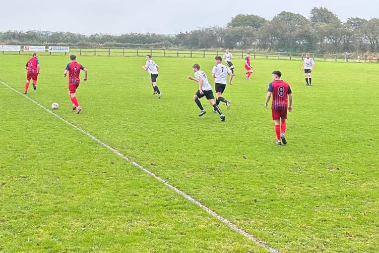 Action from Ffostrasol's 1-0 win against visitors Dewi Stars