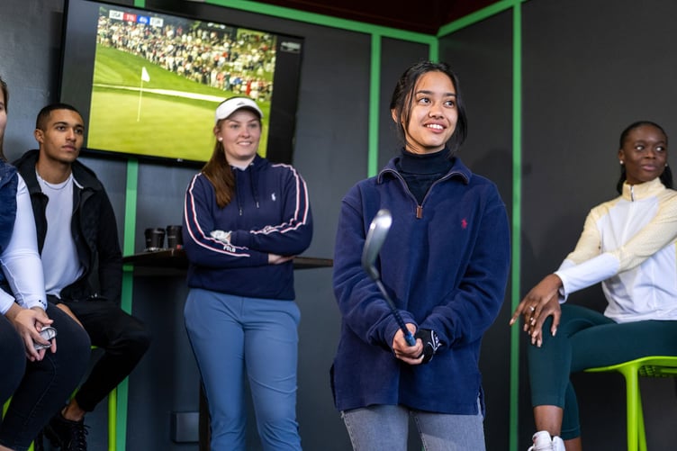 Golfers at a driving range