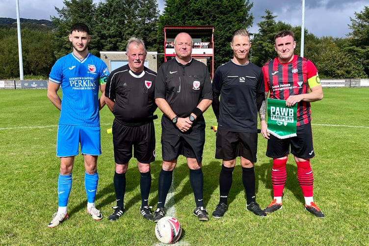 Porthmadog and Nantlle Vale captains with match officials showing their support for the FAW's Fair Play campaign
