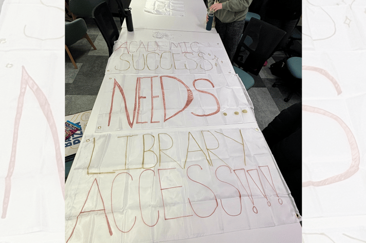 One of the banners 'academic success needs library access'
