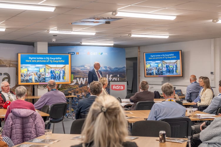 Chairman of Adra’s Board, Cllr Hywel Eifion, presents the annual report at the AGM