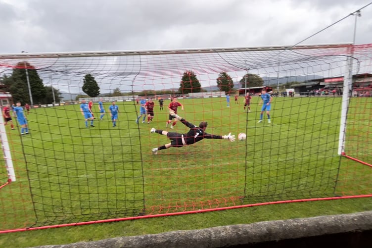 Cai Jones opens the scoring for Porthmadog against Nantlle Vale