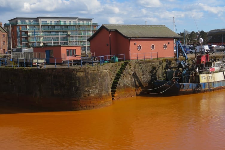 Discoloured discharge water in Whitehaven Harbour (Marianne Wildart photo)