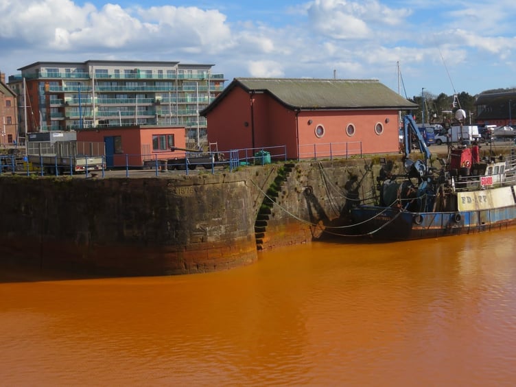 Discoloured discharge water in Whitehaven Harbour (Marianne Wildart photo)