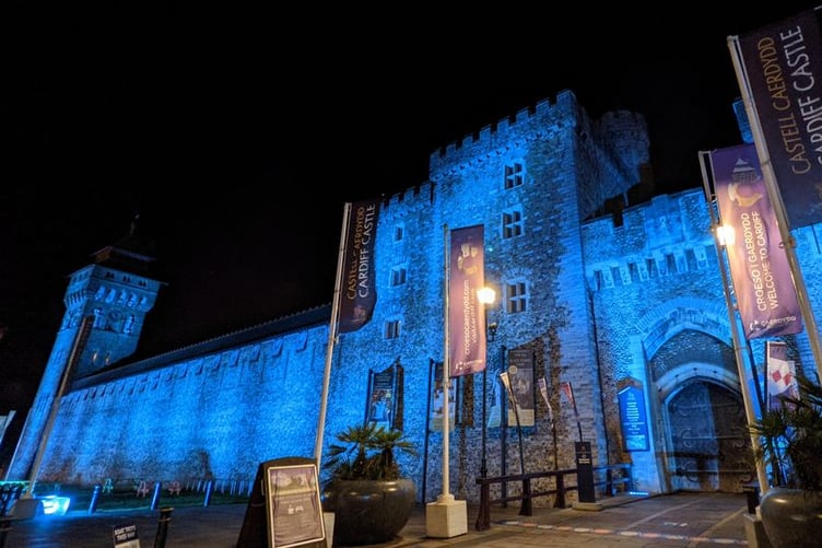Cardiff Castle lit up blue for Versus Arthritis