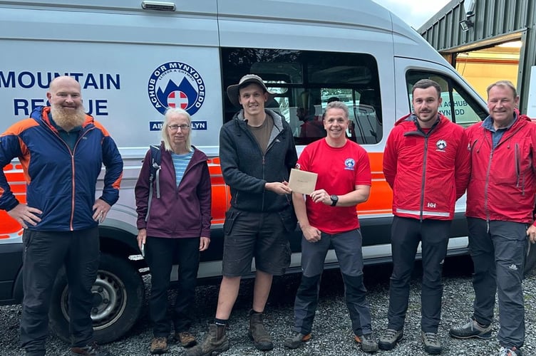 Aberglaslyn Mountain Rescue Team shared this photograph of the presentation of the funds