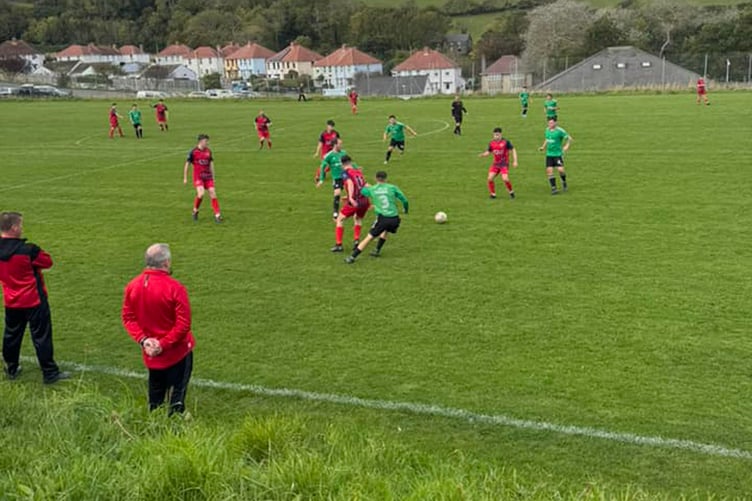 Action from Dewi Stars' 2-0 win at New Quay