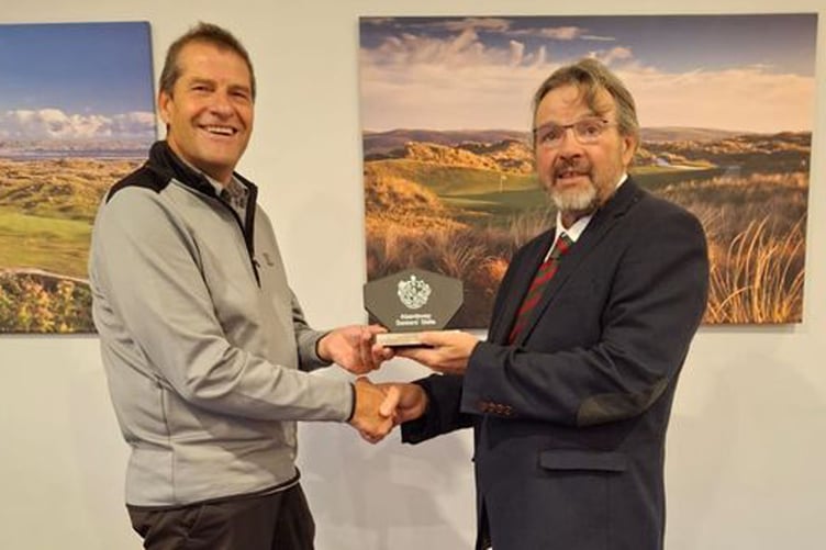 Martin France receiving the Slate trophy from Men's Vice Captain Dave Williams